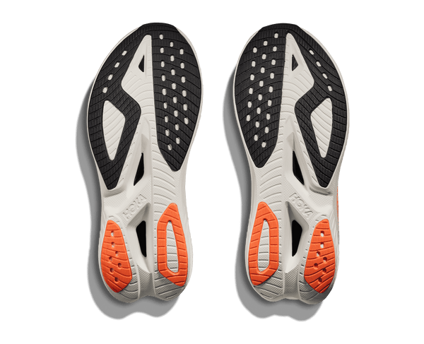Black rubber is used on the outsole around the toe white neon orange rubber is used near the heel. 