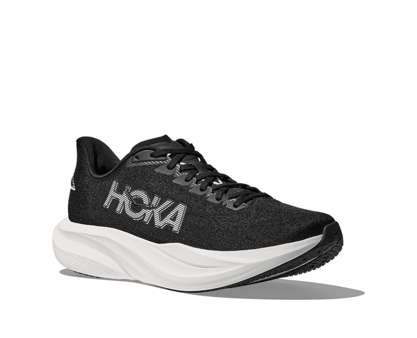 Black running shoe with white sole on a transparent background