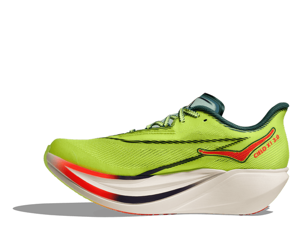 Green running shoe with red accents on a transparent background
