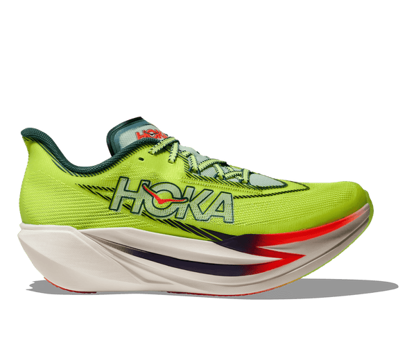 Green Unisex sized Hoka running shoe with Hoka branding on a transparent background