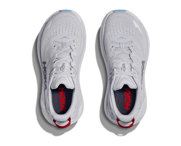 White running shoes with red accents on a transparent background