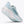 A Hoka running shoe in light blue and white, shown from a side profile view against a clean white background.