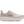 Cream colored running shoe on a white background
