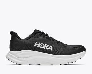 Black running shoe with black and white accents on a white background