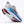 White running shoe with blue and red sole on a white background