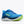 Blue running shoe with green sole on a white background