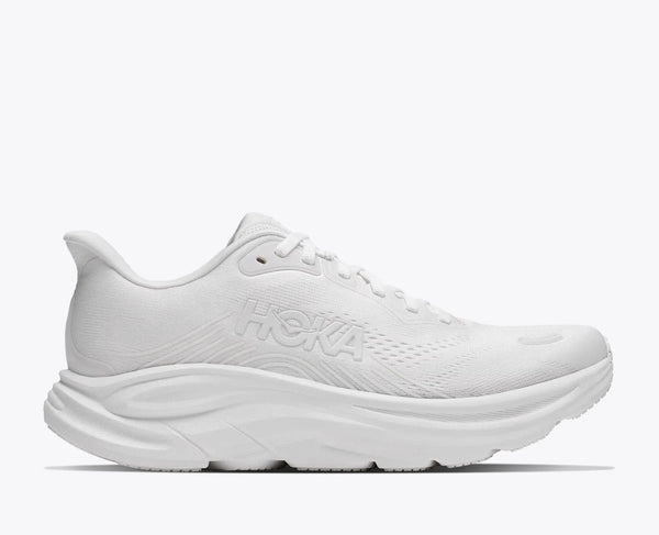 All white Hoka running and walking shoe for women.