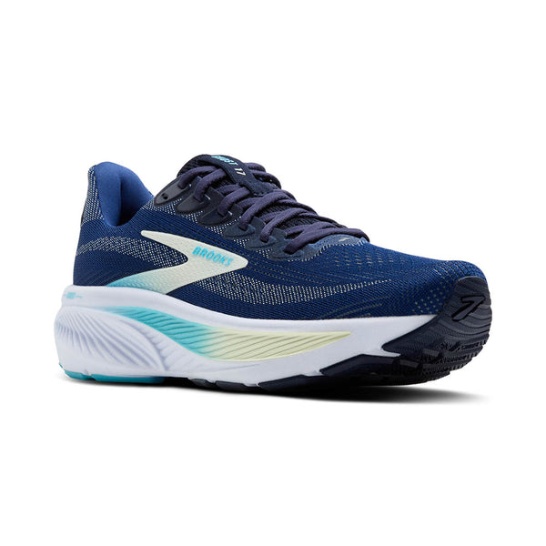 A yellow and turquoise ombre line runs through the middle of the midsole on the lateral side. 
