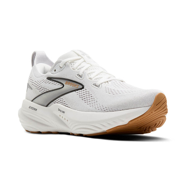 Women's white running shoe with brown sole on a white background.