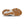 Close-up of a shoe sole with brown tread pattern on a white background.