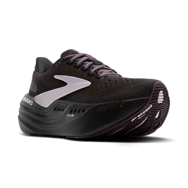 The light purple Brooks logo and purple laces pop against the black upper. 