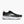 Black running shoe with white sole on a light gray background