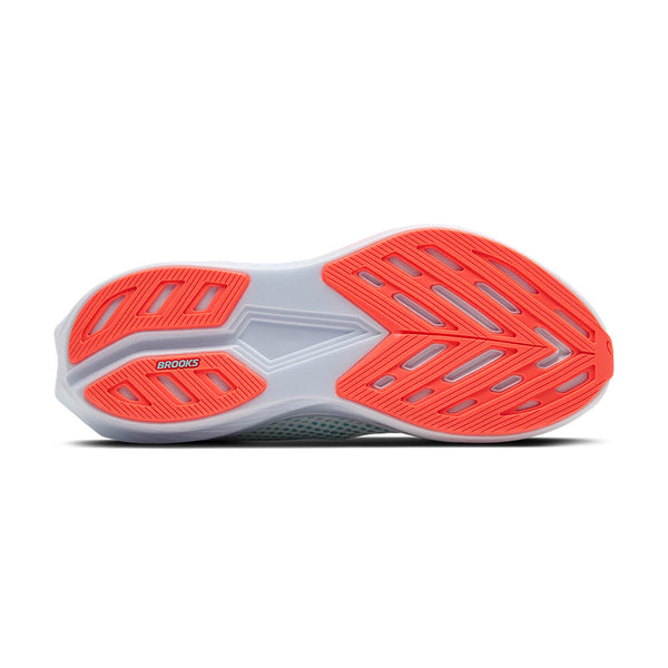 The outsole of a women's Hyperion 3 running shoe with red and white design on a white background