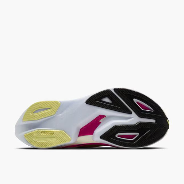 Light yellow and pink running shoe with 'Brooks' branding on a white background
