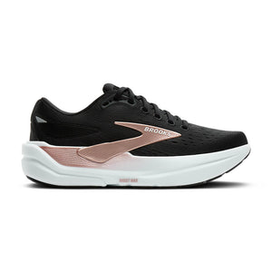 Black and rose gold running shoe with 'Brooks' branding on a white .background