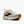 White running shoe with black accents on a white background