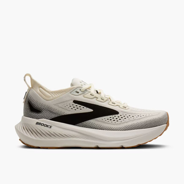 White running shoe with black accents on a white background
