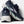 Navy and white running shoes with visible 'Brooks' branding on a light gray background