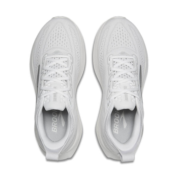 Pair of white running shoes on a white background
