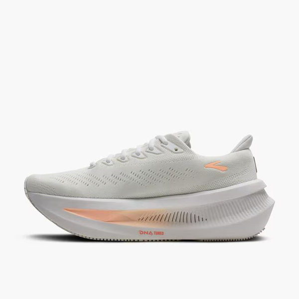 A peach ombre line runs through the middle of the midsole