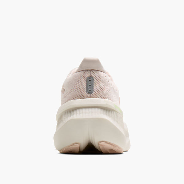 A single running shoe shown from the rear on a clean white background. The shoe features a light pink knit upper, a thick white midsole, and a small gray heel tab.