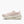 A light pink knit athletic sneaker with a chunky, sculpted off-white sole, shown in a side profile on a clean white background.