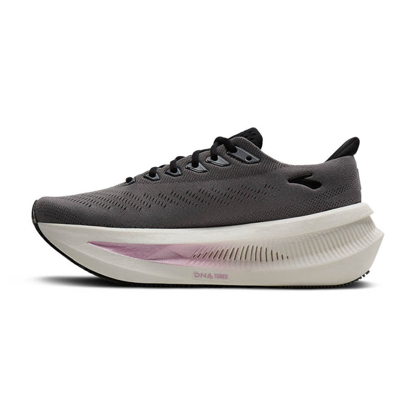 A deep pink ombre streak runs through the middle of the midsole on both sides. 