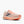 Pink running shoe with 'Brooks' branding on a white background