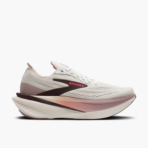 White running shoe with pink accents on a white background