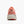 Back view of a pink and red running shoe on a white background