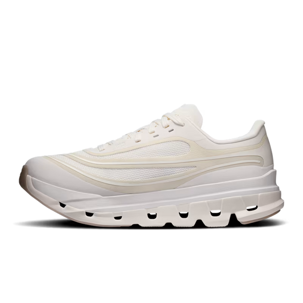 A single chunky sneaker in off-white and cream tones, shown from a side profile view against a solid white background.