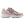 A New Balance athletic sneaker in dusty pink and white, shown against a plain white background.