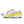 White running shoe with yellow sole on a white background
