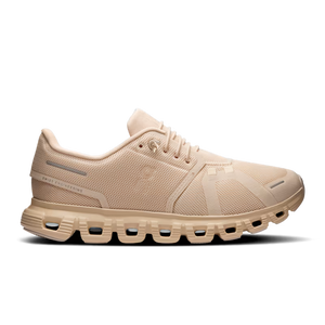 Beige running shoe on a transparent background