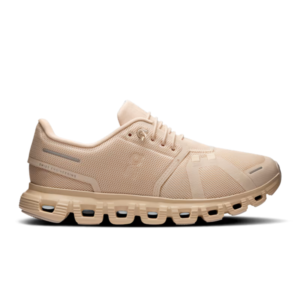 Beige running shoe on a transparent background