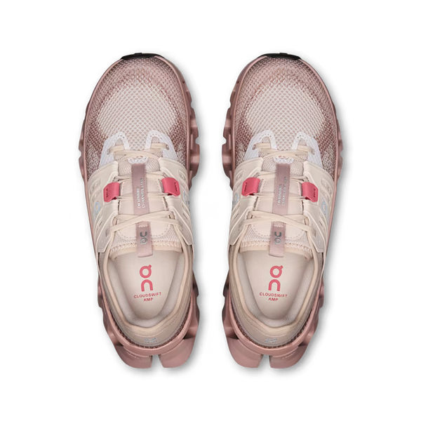 A pair of On Cloudsift AMP lifestyle shoes shown from a top-down view, featuring a dusty rose mesh upper, beige laces, and pink accents on a white background.