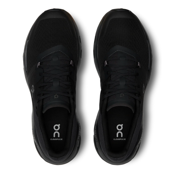 Black running shoes with 'on' logo on a white background.