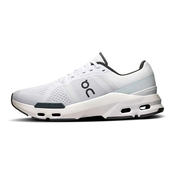 The medial side of a white running shoe with black accents on a white background.