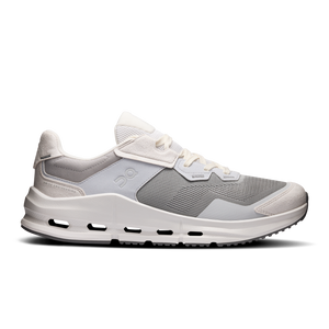 Gray athletic shoe with white sole on a white background