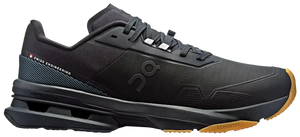 A black On running shoe with a textured mesh upper, black laces, a black midsole, and a contrasting brown outsole, on a white background.