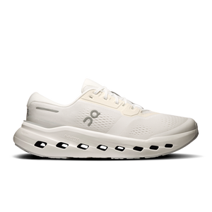 Mostly all white mens running shoe with On logo on a black background