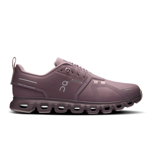 Purple running shoe with 'Swiss Engineering' text on a white background