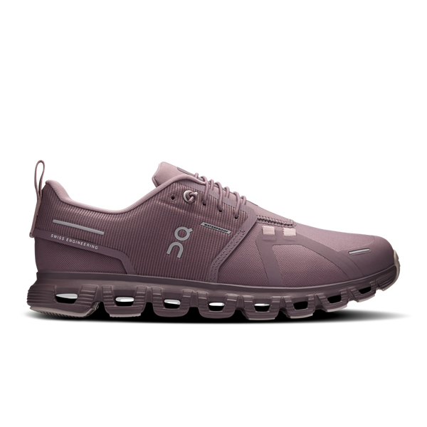 Purple running shoe with 'Swiss Engineering' text on a white background