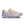 Beige running shoe with white sole on a white background