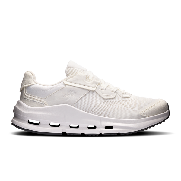 White sneaker with black swoosh logo on a black background
