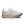 White women's running shoe with a unique sole design on a white background.