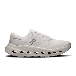 Gray and white sneaker with Nike logo on a black background