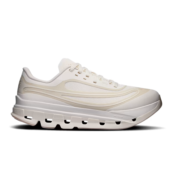 A single low-top athletic sneaker shown in a side profile on a clean white background. The shoe features a thick, sculpted chunky sole with visible air pockets, a mesh and synthetic overlay upper, and tonal laces.