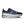 On running shoe in navy blue with a speckled pattern, a light blue On logo, and a white sculpted sole with black cutouts, shown against a plain white background.