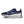 On running shoe in navy blue with a speckled pattern, a light blue On logo, and a white sculpted sole with black cutouts, shown against a plain white background.